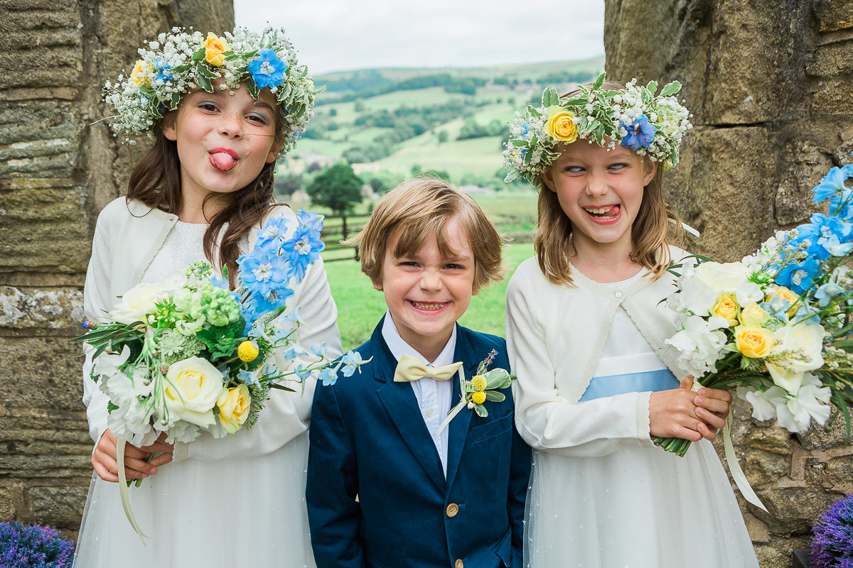 flower girls page boy pulling faces